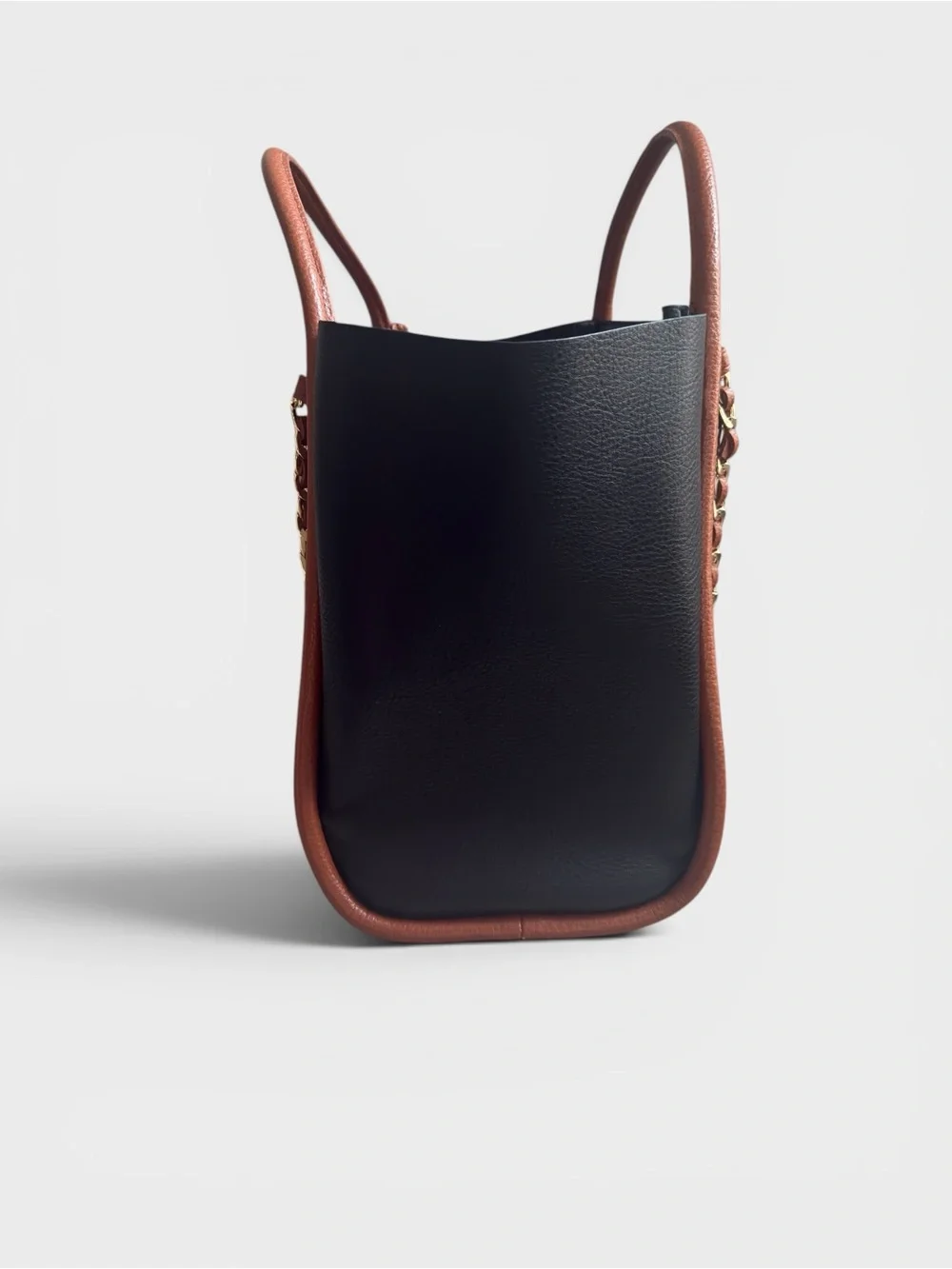 Itzy Ritzy Tri-Panel Tote in Black, Brown & White